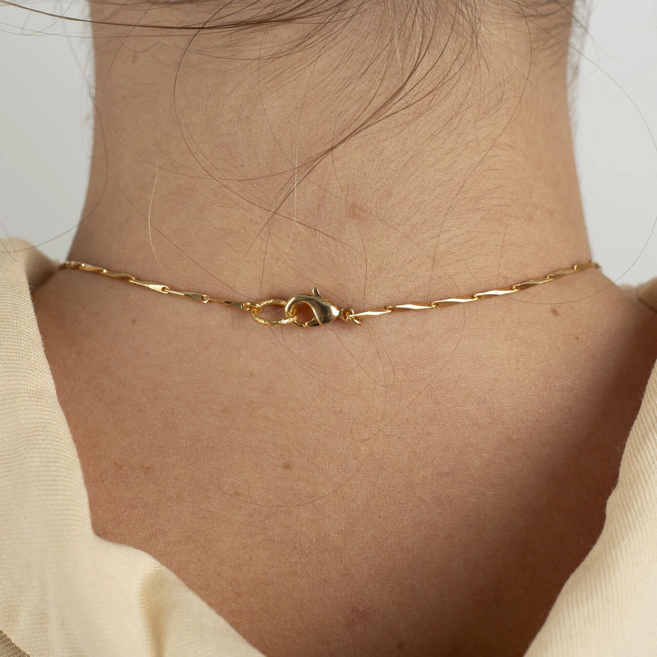 CORALINA NECKLACE WITH CHARMS AND NEEDLE CHAIN GOLD-PLATED