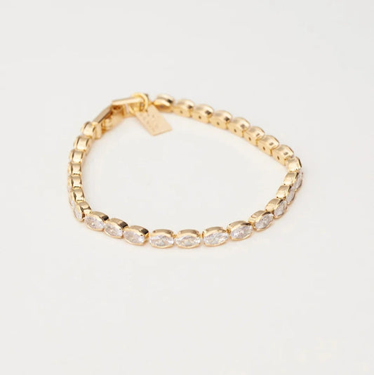 SABINA BRACELET — SLIM RIVIERA WITH COLORLESS OVAL ZIRCONIAS AND GOLD PLATING