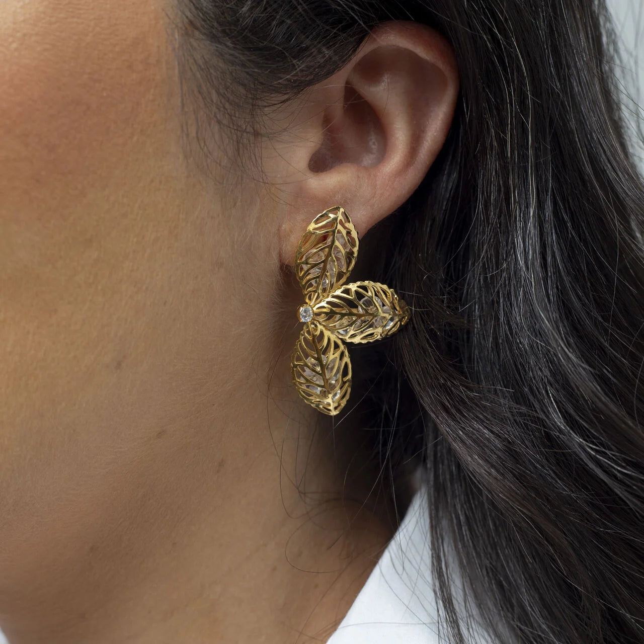 HALF-LEAF EARRINGS WITH CRYSTALS GOLD PLATED